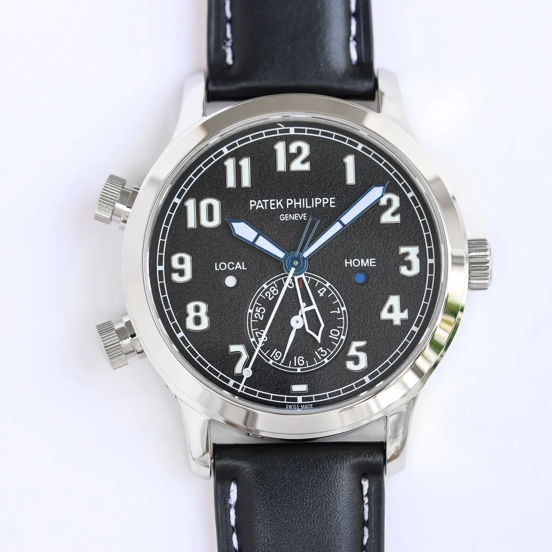 src_0-186.webp Patek Philippe Calatrava Pilot Travel Time Black Dial - Image 1